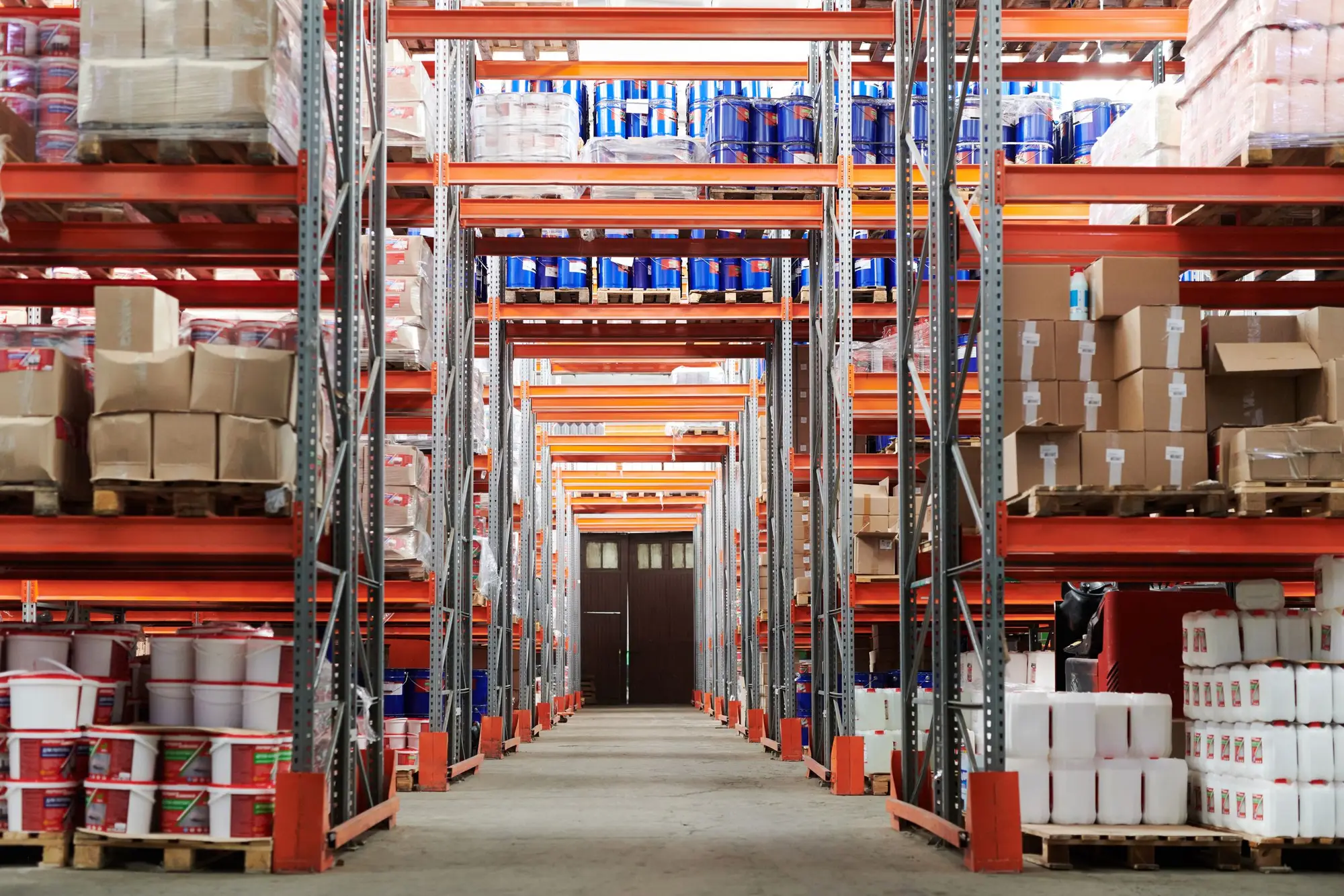 Wide warehouse interior with stocked shelving